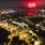 building exterior and water at night with fireworks The Beam New London CT luxury apartments
