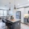 kitchen stainless steel appliances with island table The Beam New London CT luxury apartments