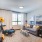 living room with seating and sleek plank flooring  The Beam New London CT luxury apartments