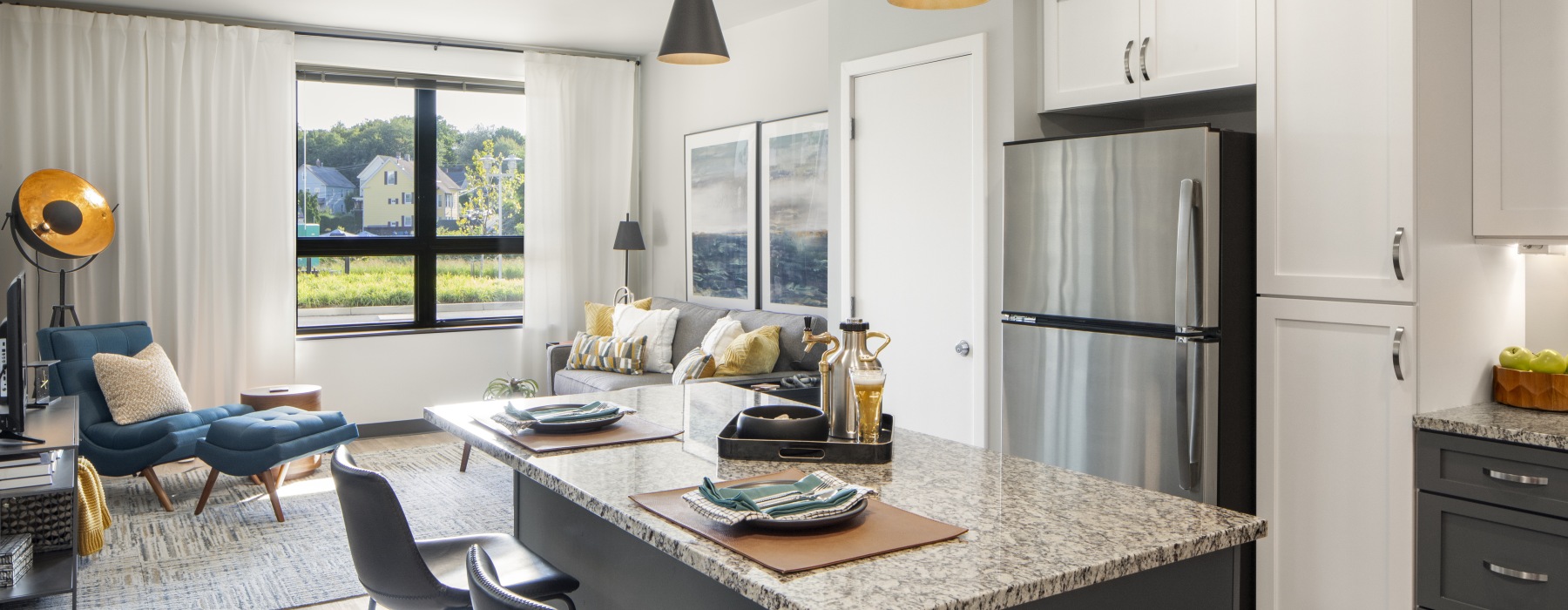 kitchen with island and open to living area - new london ct apartments